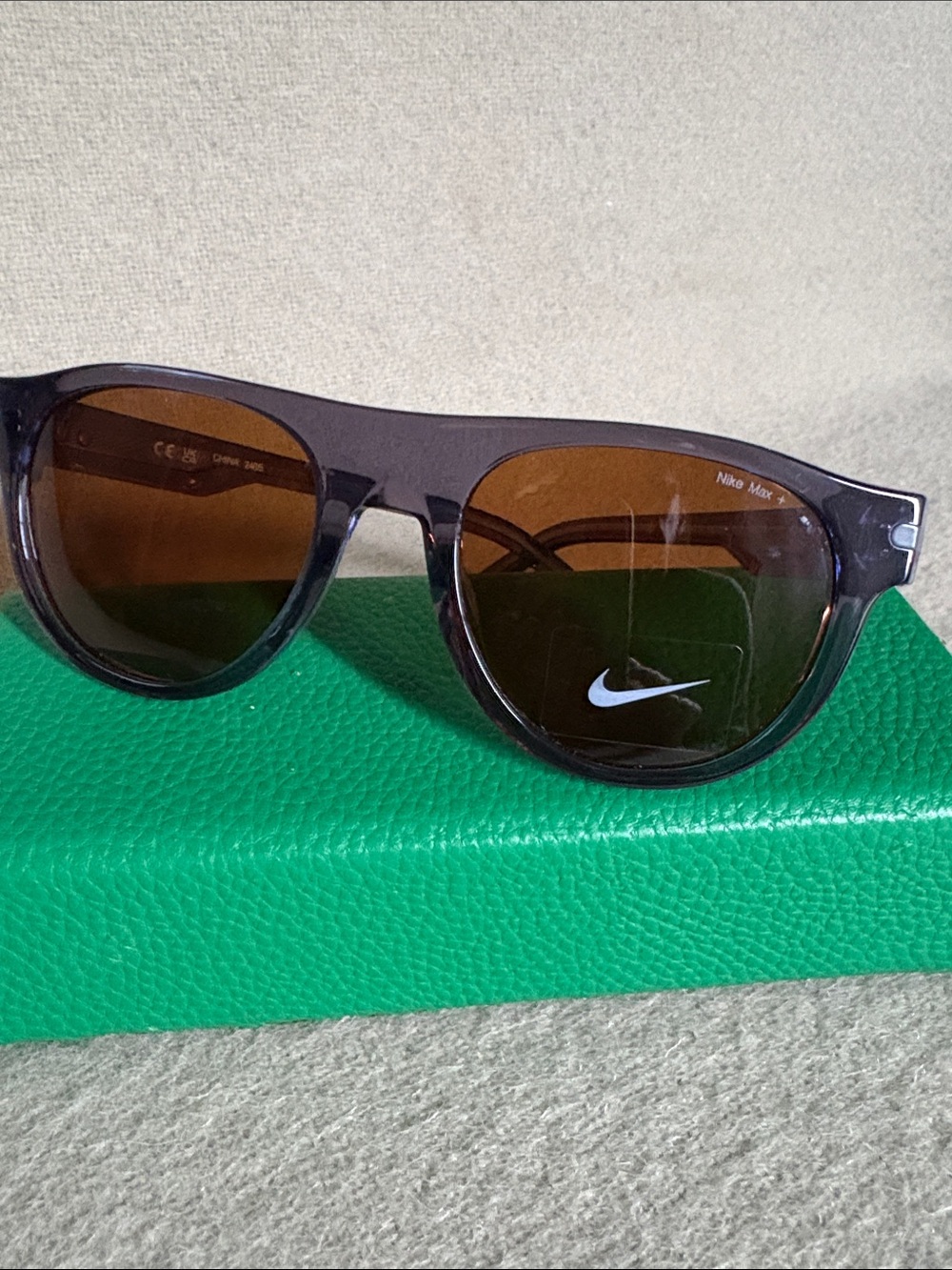 Nike Women’s Translucent Dark Brown Frame Sunglasses with Brown Lenses